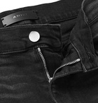 AMIRI - Skinny-Fit Distressed Stretch-Denim Jeans - Men - Black