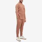 Homme Plissé Issey Miyake Men's Long Sleeve Pleated Roll Neck in Pink/Red Hued