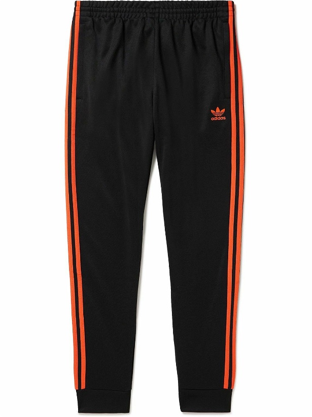 Photo: adidas Originals - Logo-Embroidered Striped Recycled-Jersey Sweatpants - Black