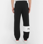 Givenchy - Tapered Logo-Print Loopback Cotton-Jersey Sweatpants - Men - Black