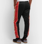 Gucci - Slim-Fit Tapered Printed Silk-Trimmed Jersey Track Pants - Black