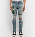 AMIRI - Thrasher Skinny-Fit Appliquéd Distressed Stretch-Denim Jeans - Men - Light denim