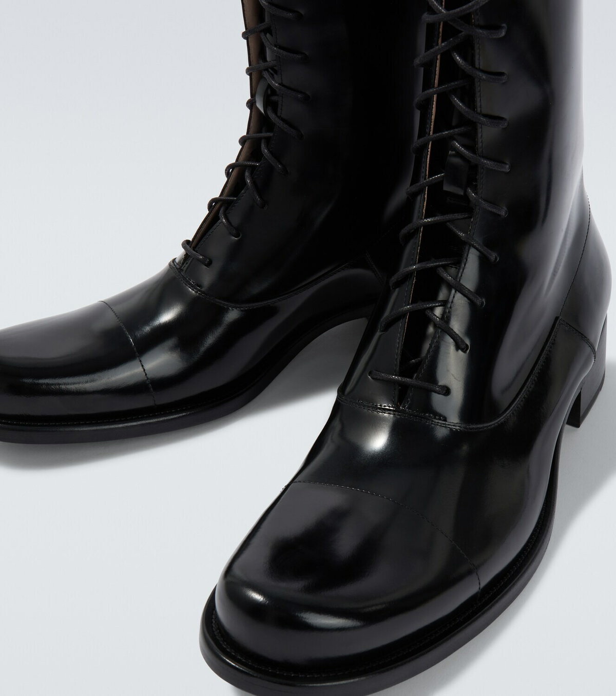 The Row Kai patent leather lace-up boots