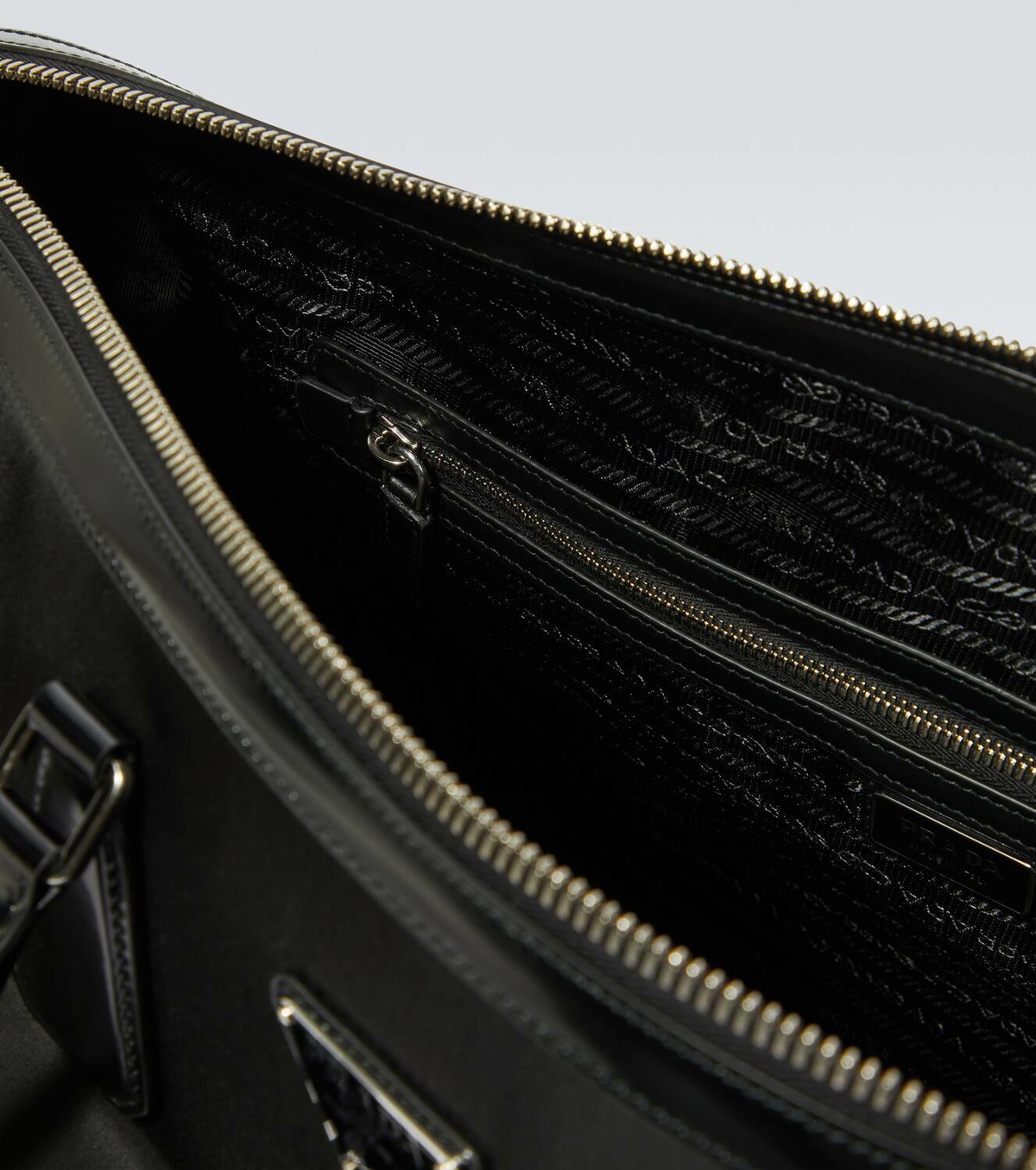 Prada Leather-trimmed duffel bag