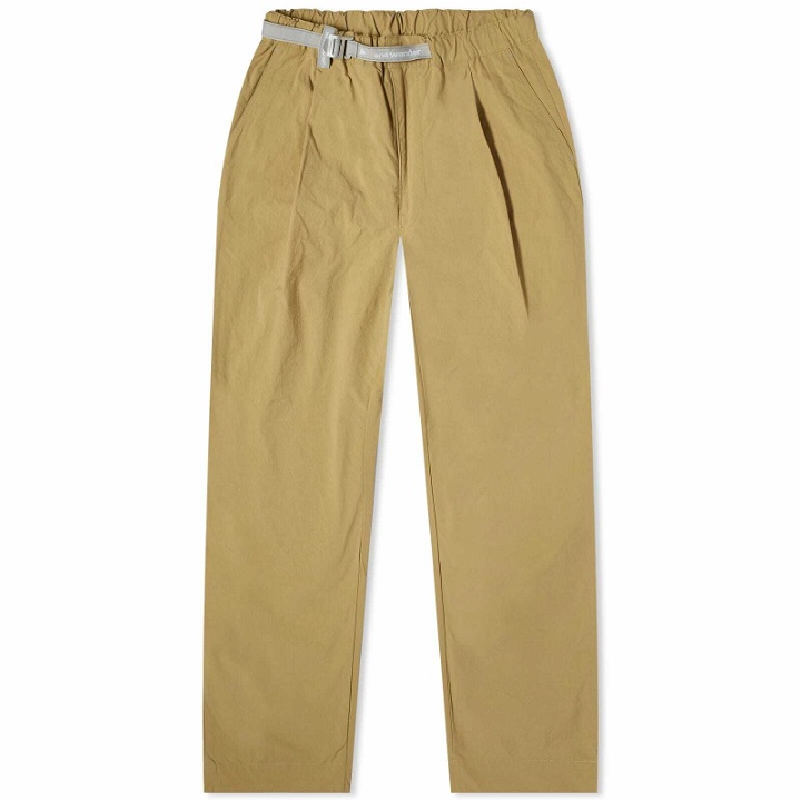Photo: and wander Men's Nylon Chino Tuck Tapered Pants in Beige