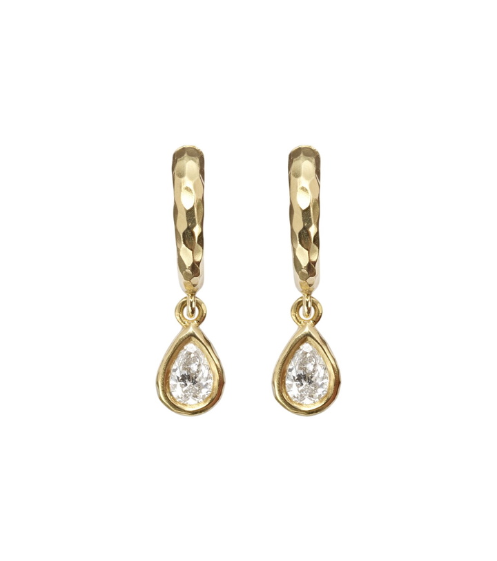Photo: Octavia Elizabeth Hidden Gem 18kt gold huggies with diamonds