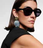 Alaïa Lettering Logo round sunglasses