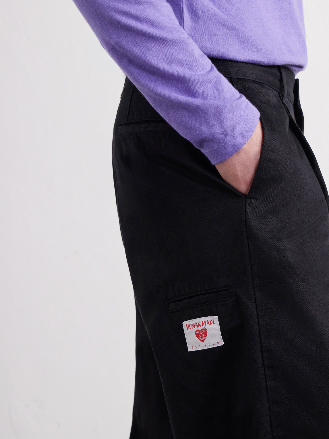 Human Made - Tapered Pleated Cotton-Canvas Trousers - Black