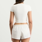 Nike Women's x SKIMS Matte Corset Short Sleeve Crop Top in Ivory