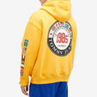 Tommy Jeans Men's Archive Games Hoodie in College Gold