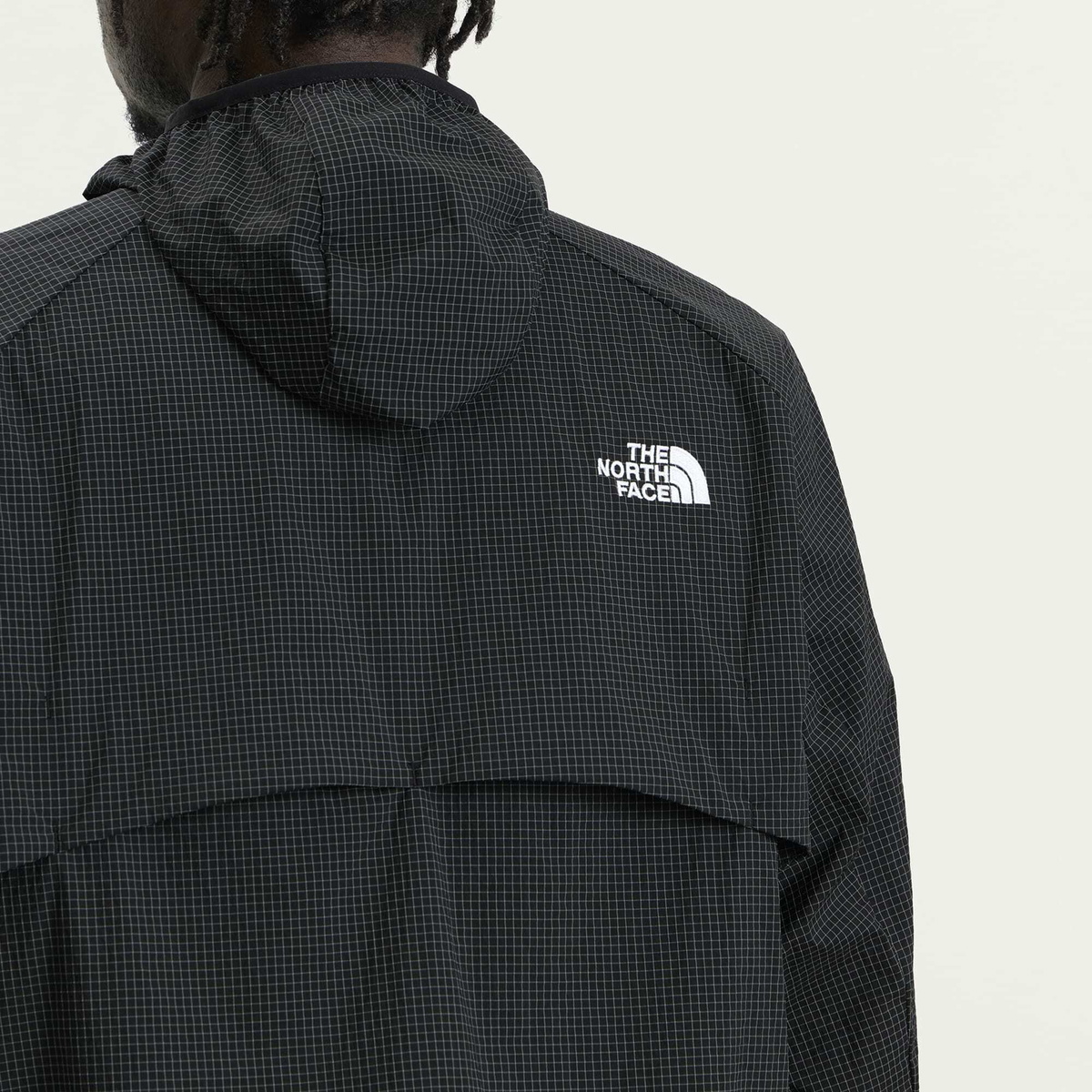The North Face Men's NSE Wind Jacket in Tnf Black