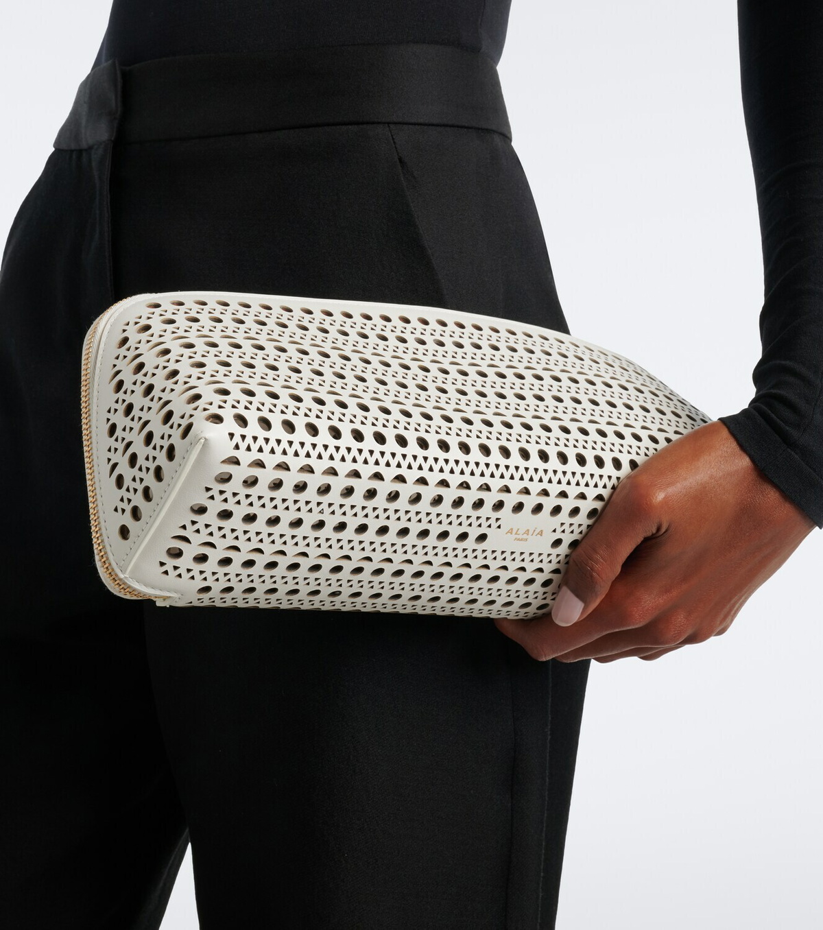 Alaïa Delta Small leather clutch