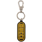 Gucci Black and Yellow Rubber Logo Keychain