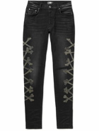 AMIRI - Skinny-Fit Appliquéd Distressed Jeans - Black