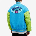 Members of the Rage Men's Oversized Varsity Jacket in Turquoise/Acid Lime