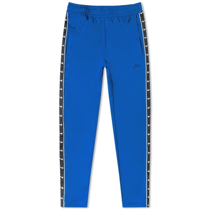 Photo: Nike Taped Poly Track Pant