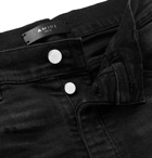 AMIRI - MX2 Skinny-Fit Leather-Panelled Distressed Stretch-Denim Jeans - Black