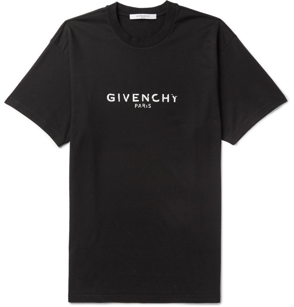 Distressed cotton sweatpants in black - Givenchy