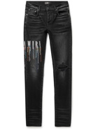 AMIRI - Skinny-Fit Logo-Embroidered Distressed Jeans - Black