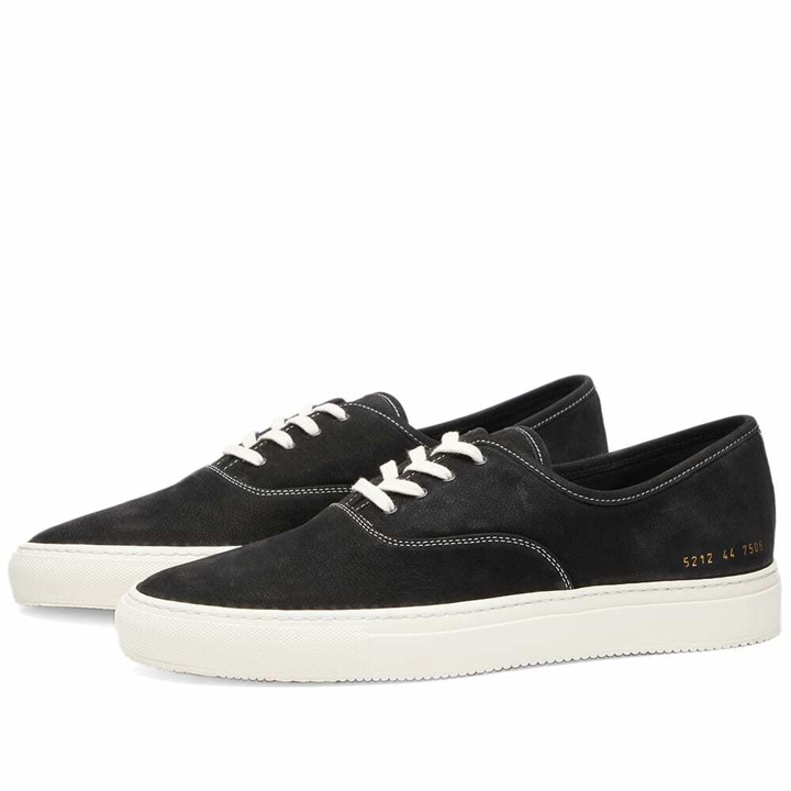 Photo: Common Projects Men's Four Hole Sneakers in Black/White