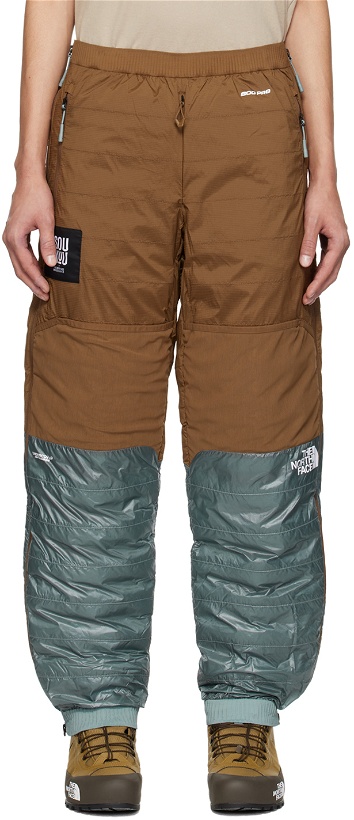 Photo: UNDERCOVER Brown & Blue The North Face Edition Down Trousers