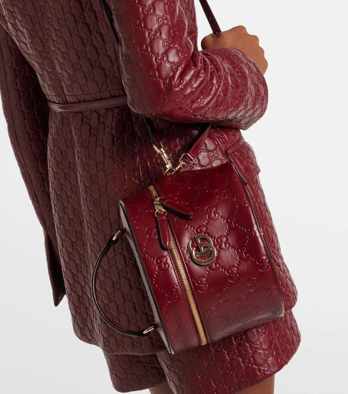 Gucci GG embossed leather vanity bag