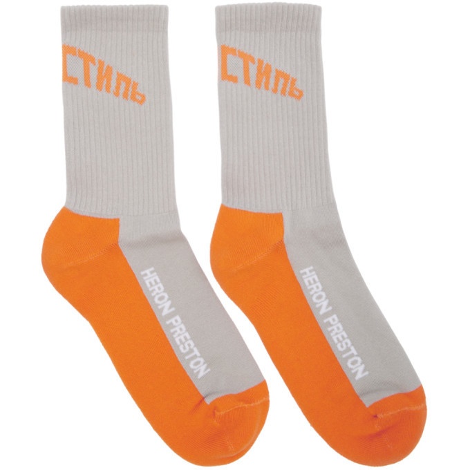 Photo: Heron Preston Grey and Orange Logo Socks
