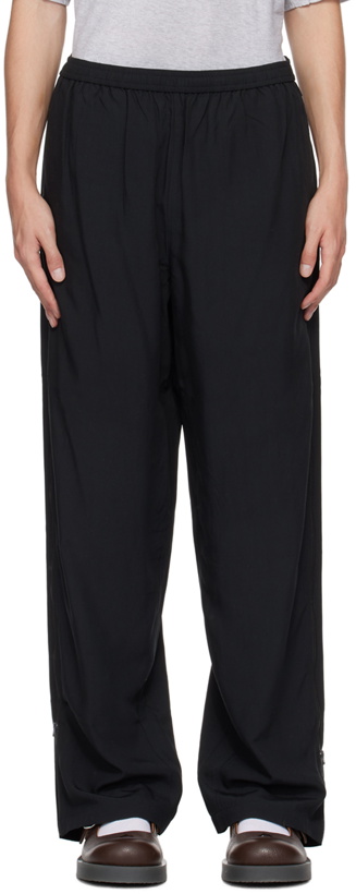 Photo: Acne Studios Black Relaxed-Fit Zip Trousers
