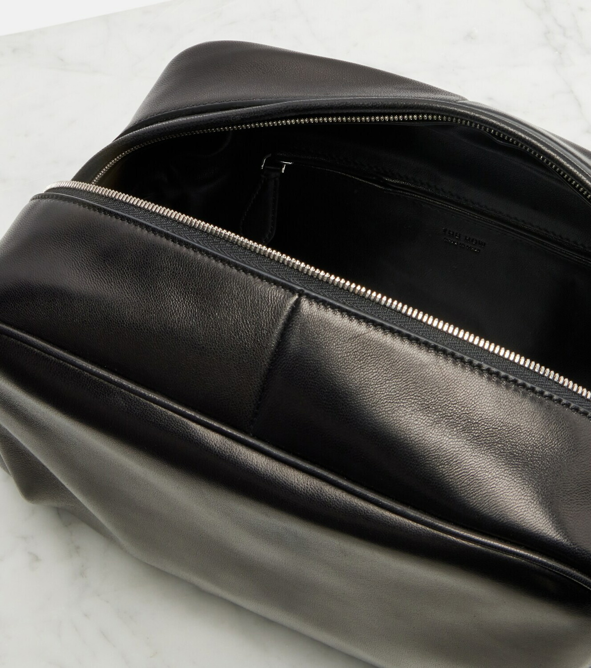 The Row Leila Small leather clutch