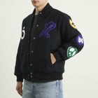 NOMARHYTHM TEXTILE Men's x Needles Patch Varsity Jacket in Black X Mix
