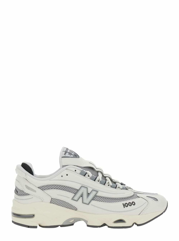 Photo: New Balance Grey Low Top Sneakers With Logo Patch On Side And Tongue And Perforated Panels In Tech Fabric Unisex