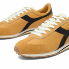 Diadora Men's Rally Punched Sneaker in Orange Mustard