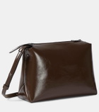 Khaite Lina patent leather crossbody bag