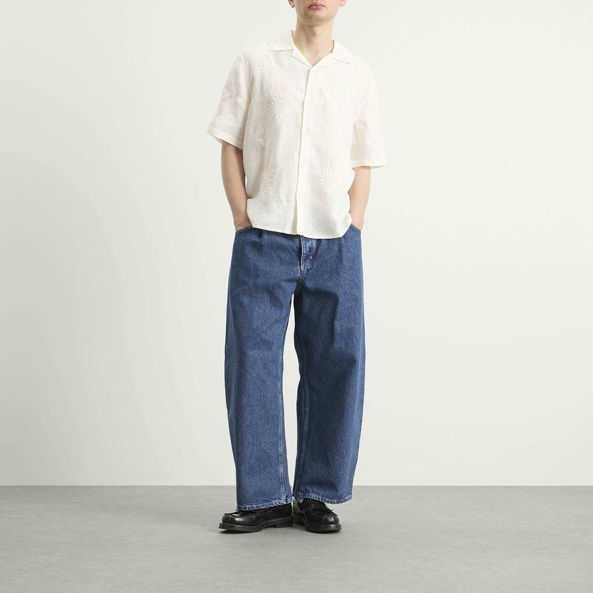 A Kind of Guise Men's Duma Pleated Denim Jeans in Worn Denim