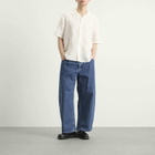 A Kind of Guise Men's Duma Pleated Denim Jeans in Worn Denim
