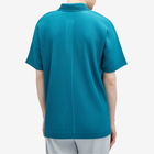 Homme Plissé Issey Miyake Men's Pleated Polo Shirt in Teal Green