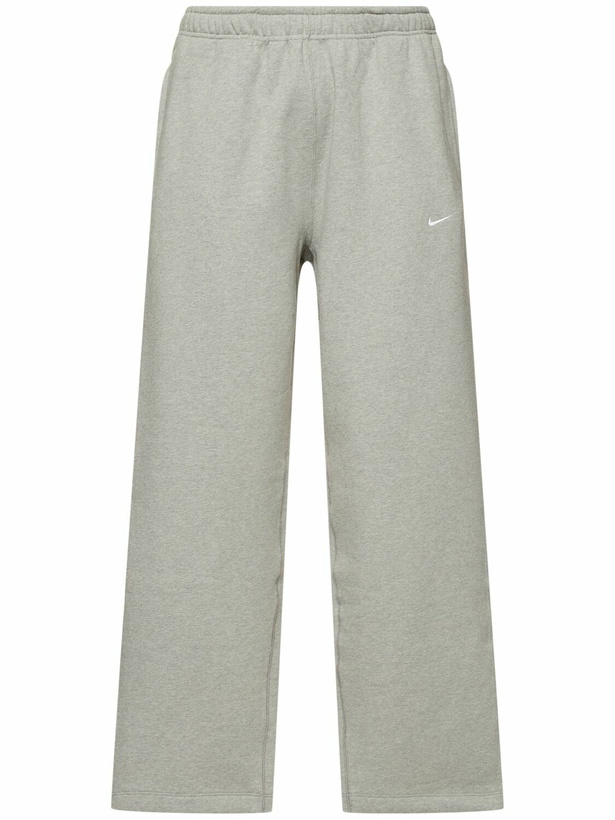 Photo: NIKE Solo Swoosh Pants