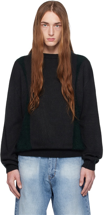 Photo: Youth Green Curved Sweater