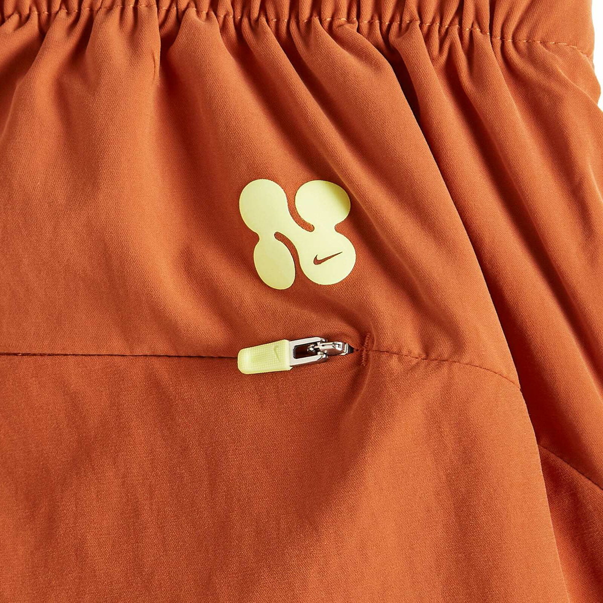Nike Parachute Pant in Russet/Lemon
