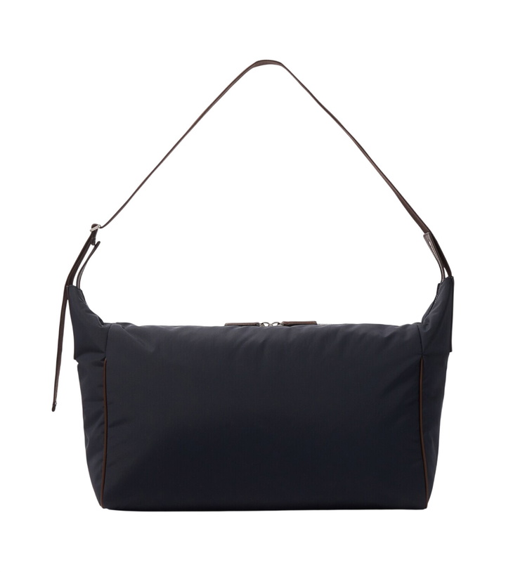 Photo: The Row Logan E/W leather-trimmed crossbody bag