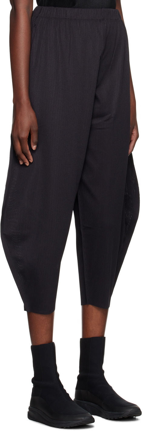 パンツ ISSEY MIYAKE PLEATS PLEASE A-POC BOTTOMS Pleats Please Issey Miyake Black A-Poc Trousers Pleats Please
