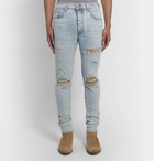 AMIRI - MX1 Skinny-Fit Suede-Panelled Distressed Stretch-Denim Jeans - Blue