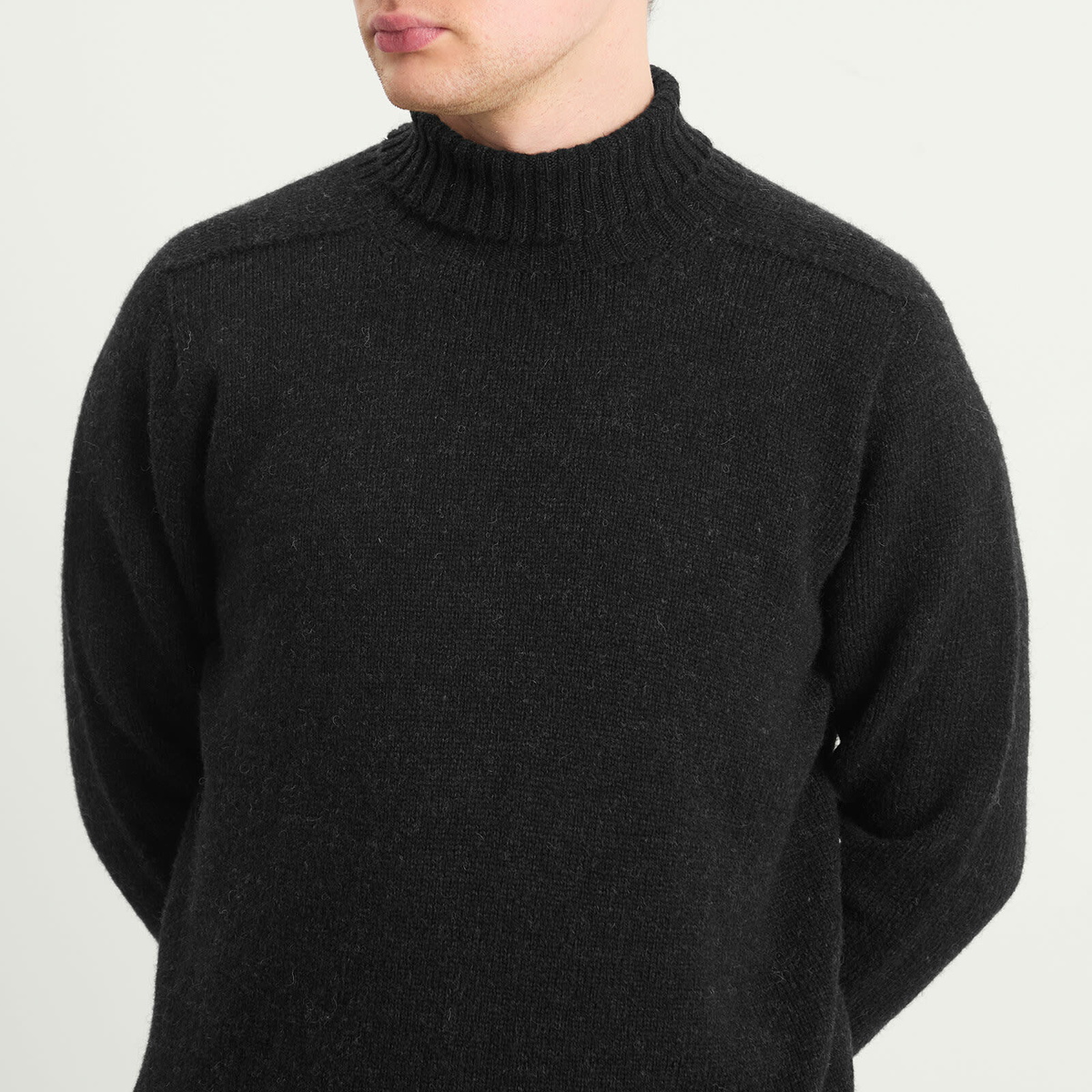 Jamieson's of Shetland Men's Jamiesons of Shetland Roll Neck Knit in Black Mix