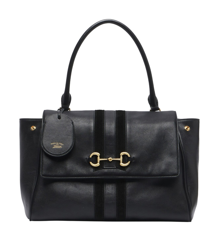 Photo: Gucci Paparazzo leather Medium shoulder bag