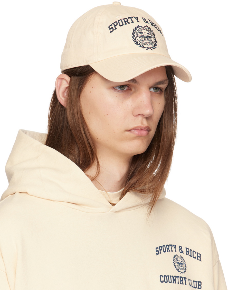 Sporty & Rich Off-White Varsity Crest Cap