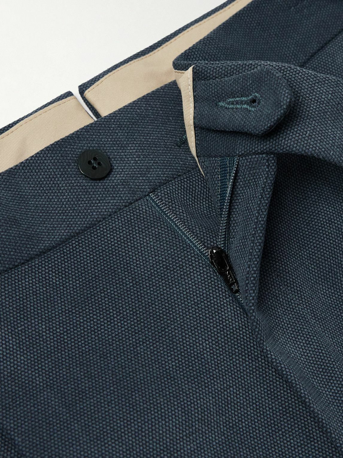 Stòffa - Tapered Pleated Cotton-Canvas Trousers - Blue