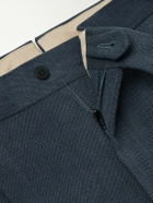 Stòffa - Tapered Pleated Cotton-Canvas Trousers - Blue