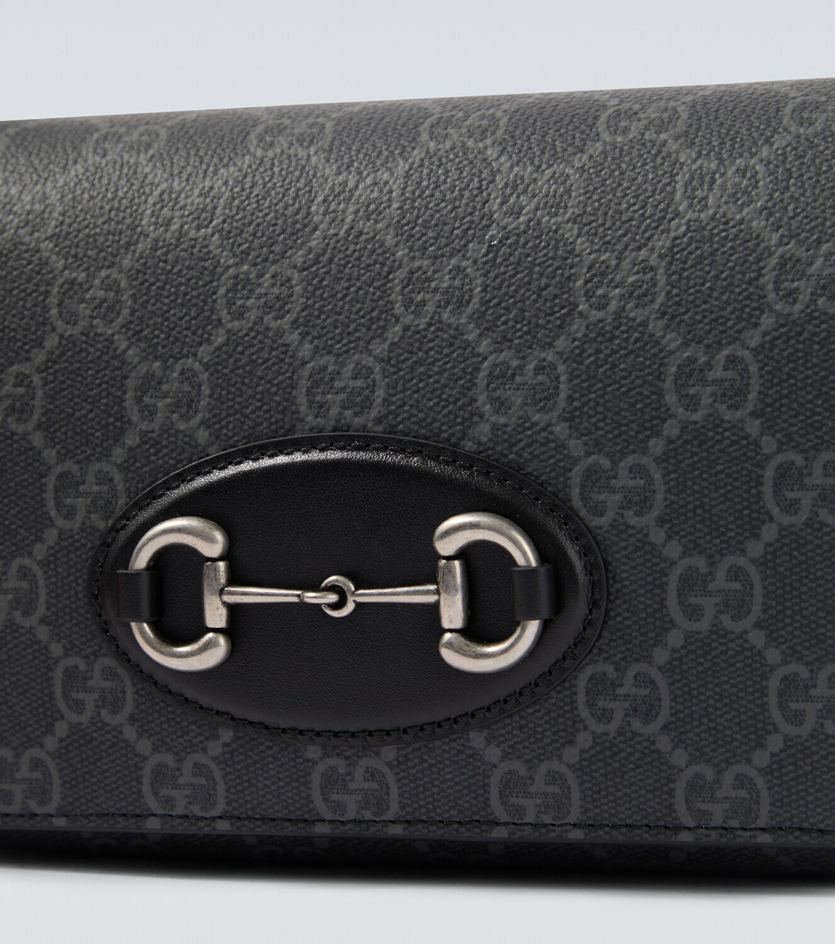 Gucci GG Supreme leather-trimmed canvas crossbody bag