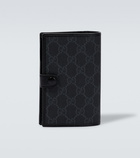 Gucci - GG embossed passport holder