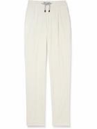 Brunello Cucinelli - Tapered Pleated Cotton-Corduroy Drawstring Trousers - Neutrals